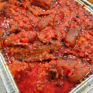 Ata dindin (palmoil sauce with ponmo and dried fish))